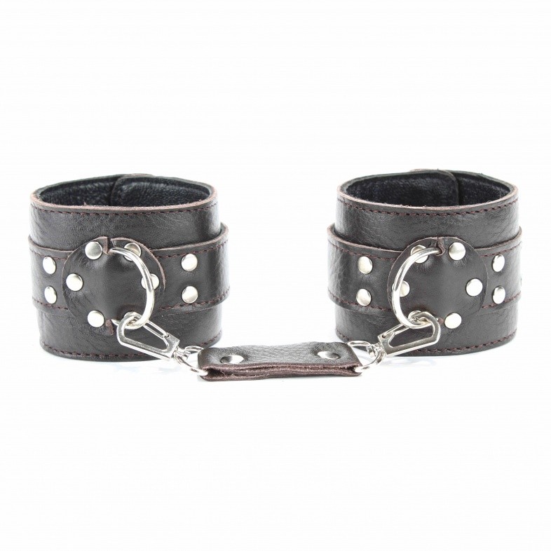 Наручники из натуральной мягкой кожи темно-коричневого цвета.