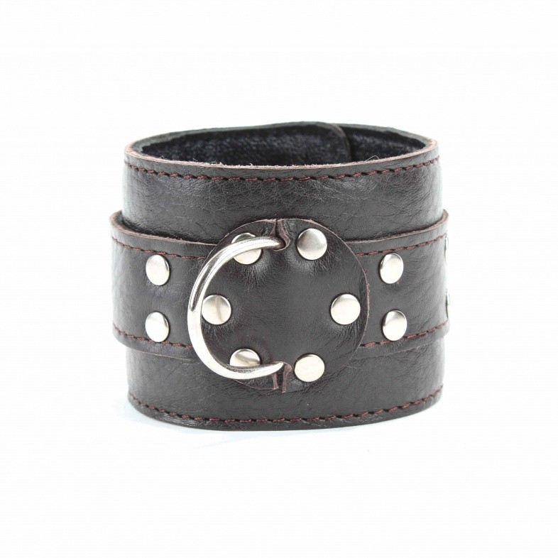 Наручники из натуральной мягкой кожи темно-коричневого цвета.